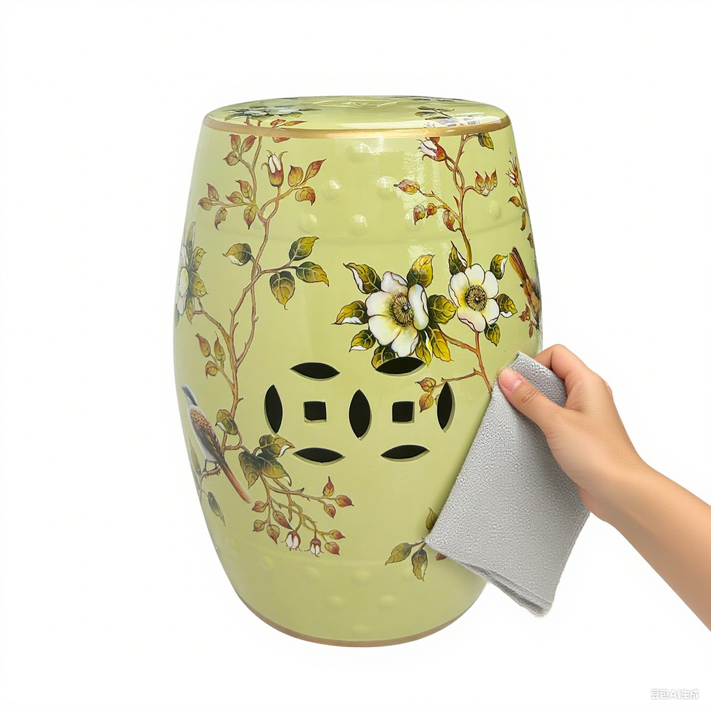 Vintage-inspired Light Green Ceramic Drum Stool with Floral and Bird Motifs & Decorative Cut-outs