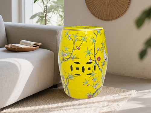 Bright Yellow Ceramic Drum Stool Featuring Blossom Branches and Birds with Decorative Cut-outs