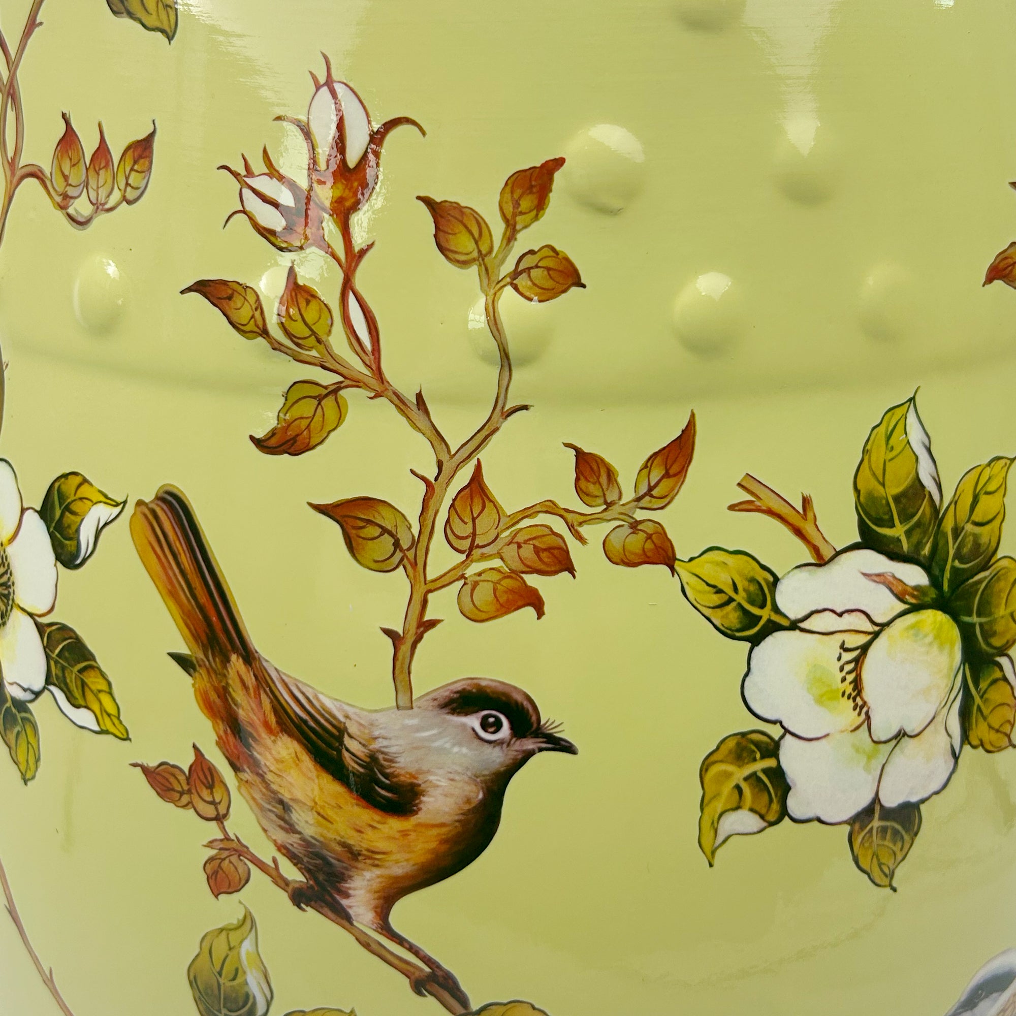 Vintage-inspired Light Green Ceramic Drum Stool with Floral and Bird Motifs & Decorative Cut-outs