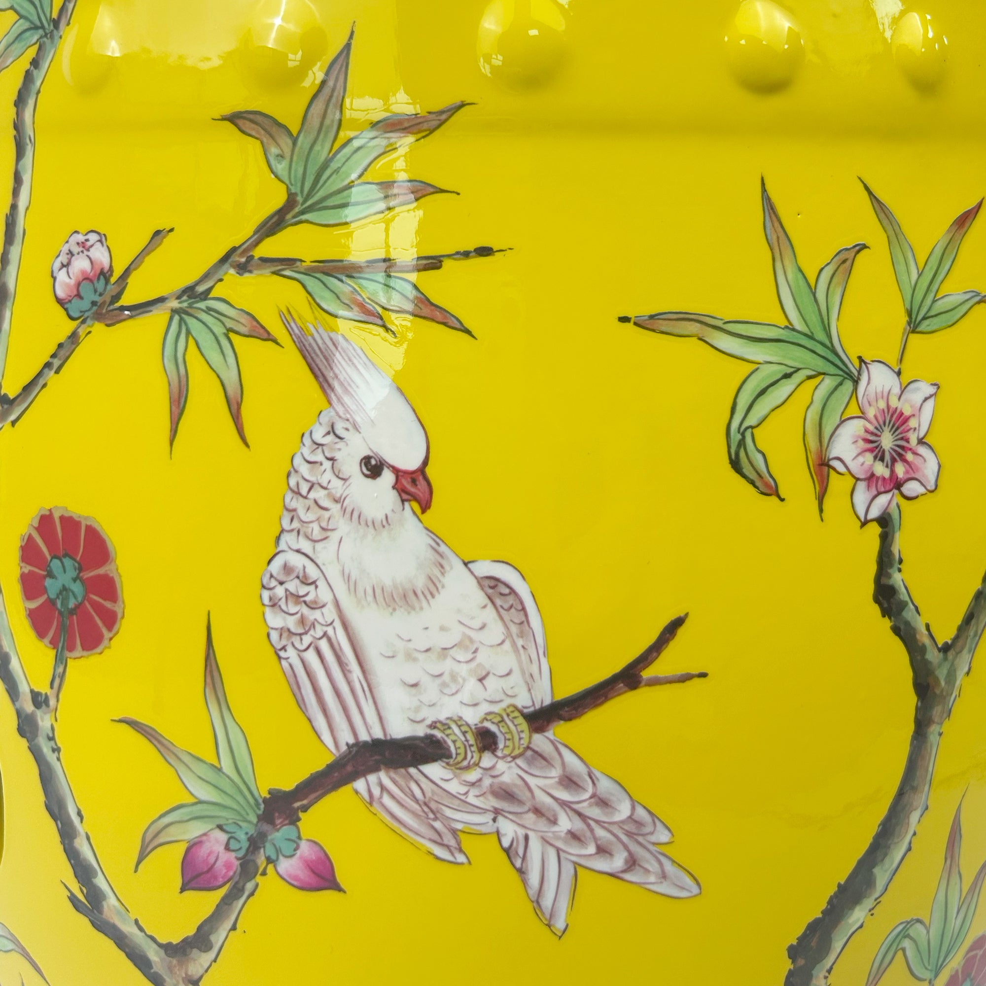 Bright Yellow Ceramic Drum Stool Featuring Blossom Branches and Birds with Decorative Cut-outs