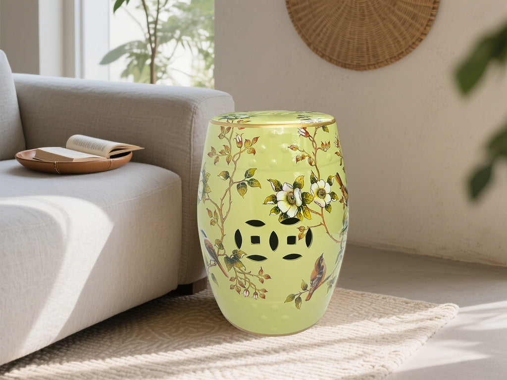 Vintage-inspired Light Green Ceramic Drum Stool with Floral and Bird Motifs & Decorative Cut-outs
