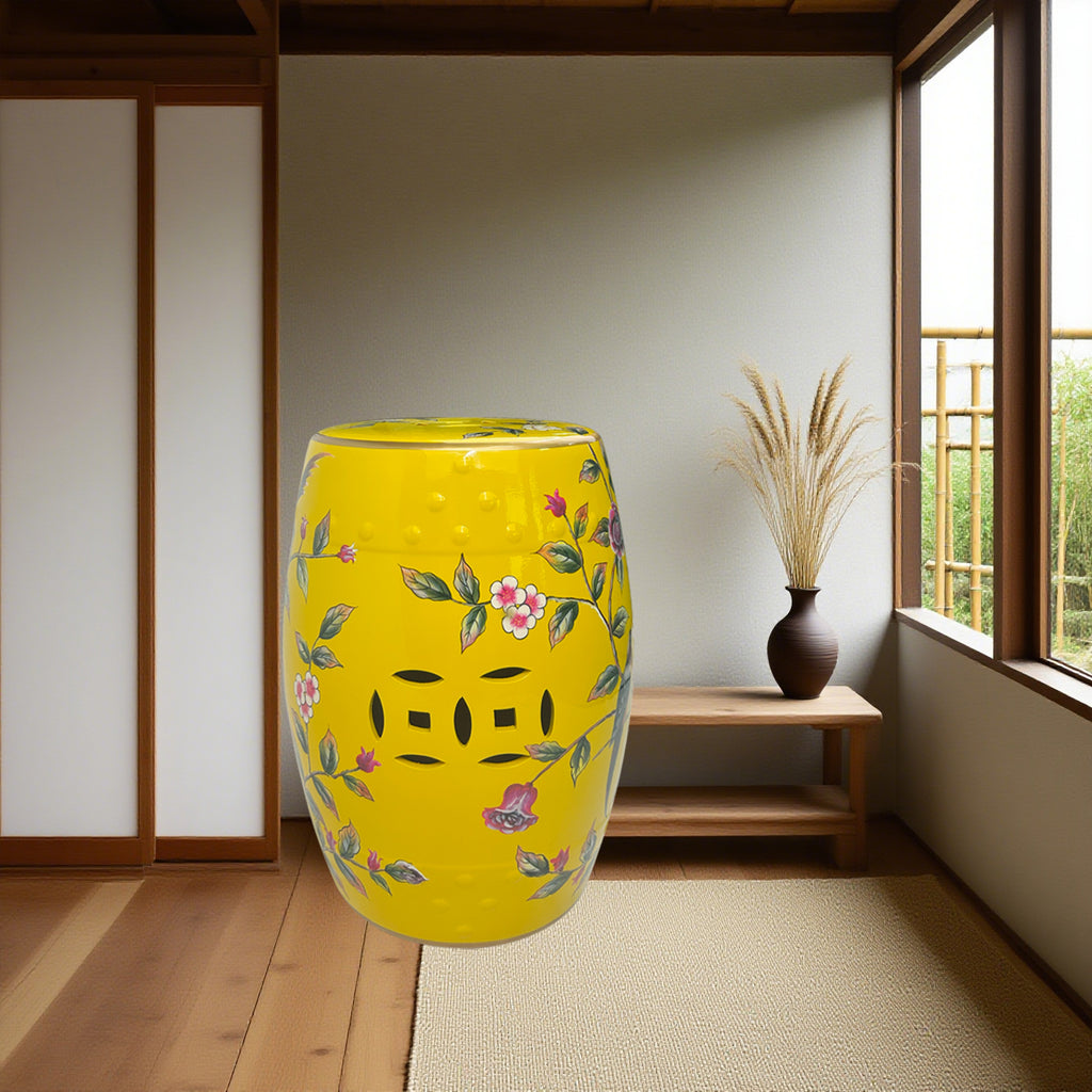 Vibrant Yellow Ceramic Drum Stool with Exquisite Floral Patterns and Decorative Perforations
